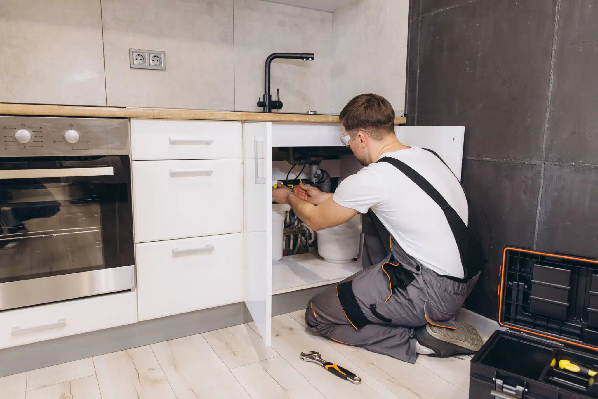 Plumbing Checkups Under Kitchen Sink.