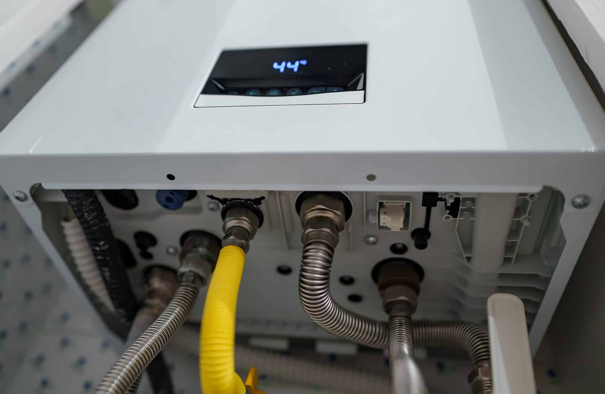 Modern Water heater and connections, Seamless Plumbing Systems.